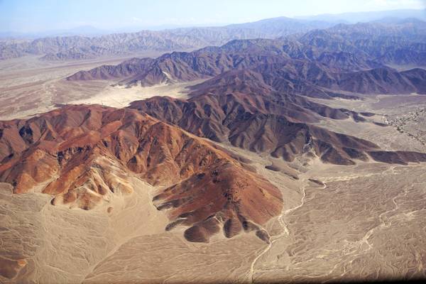 Flying over Nazca mountains, Peru