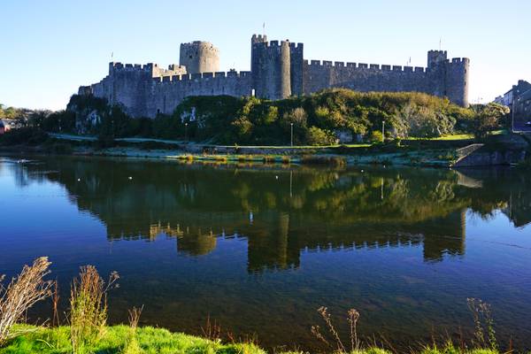 Pembroke Castle & its reflection in the moat, Wales