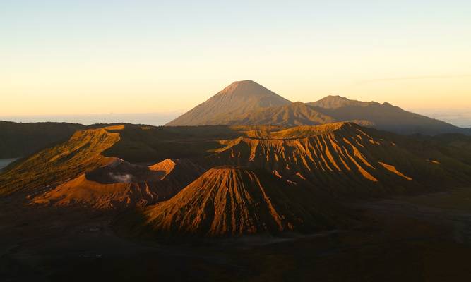 Sunrise on the Tengger caldera (Mounts Bromo, Batok, Kursi, Watangan, Widodaren, and Semeru in the background), East Java, Indonesia