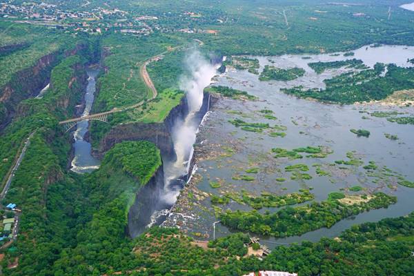 Stunning aerial view of Zambezi River falling into Victoria Falls, Zambia & Zimbabwe border