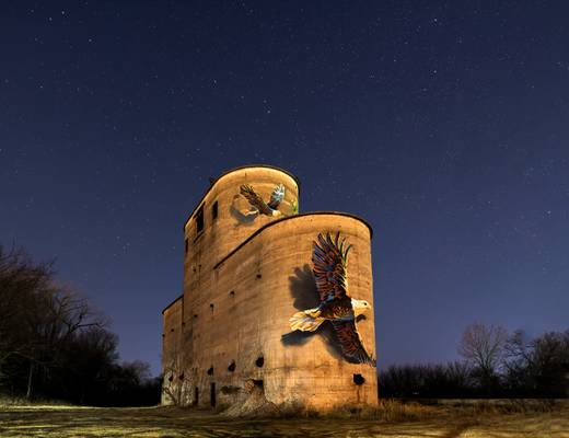 Art Work on abandoned grain Silo at night