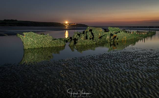 Old ship wreck in the sea @ Sunset